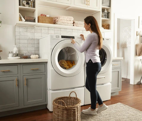 How can I tell if my dryer needs to be repaired or replaced?